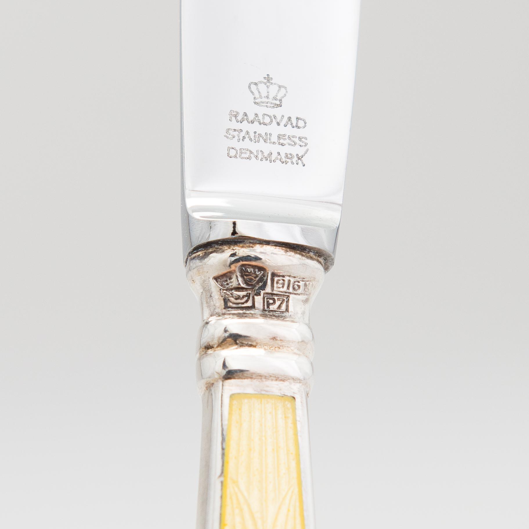 A set of twelve Tillander knives, enamel and silver (.916), Helsinki, Finland 1968. Danish steel blades.