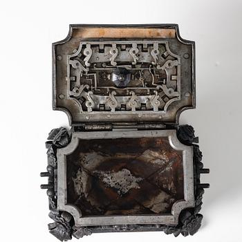 A South-German, presumably Nuremberg, Baroque iron and steel strongbox, later part of the 17th century.