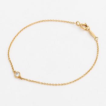 Tiffany & Co, Elsa Peretti, armband, "Diamonds by the Yard", 18K guld med en diamant ca 0.08 ct.