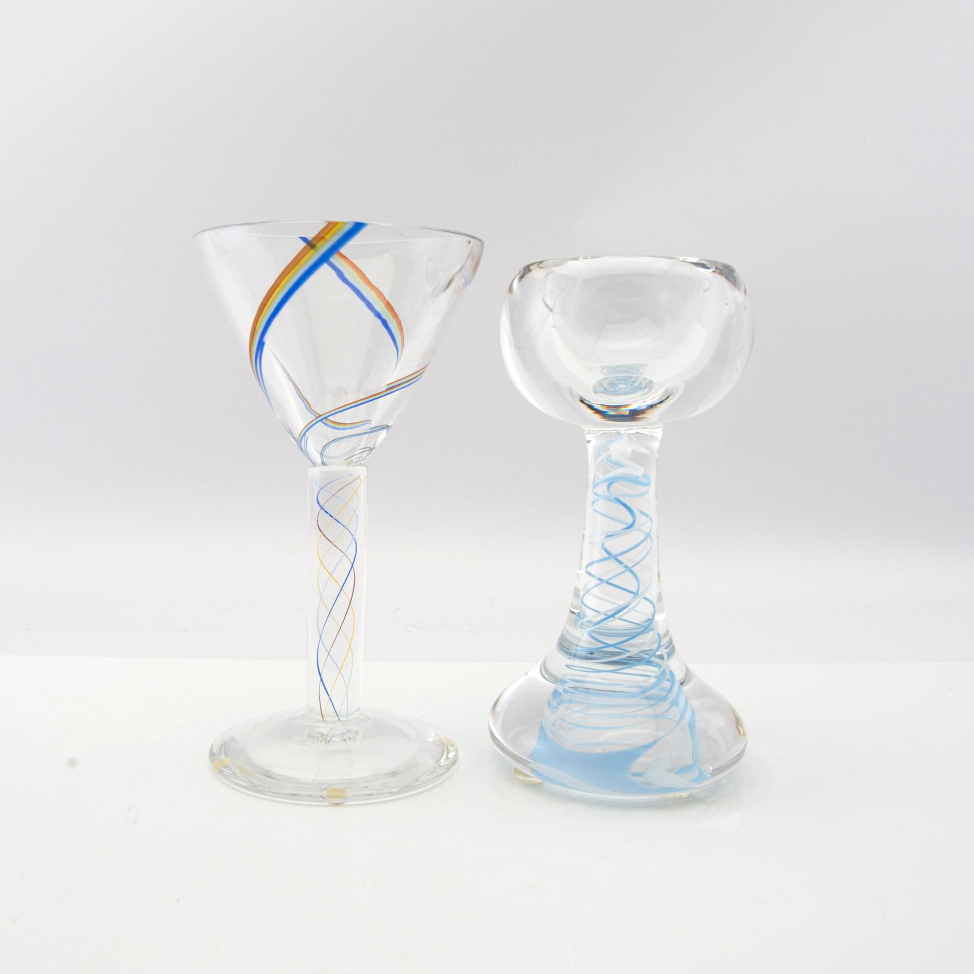 Berit Johansson, candlesticks/goblets 4 pcs signed Orrefors one marked unique.