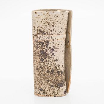 Kyllikki Salmenhaara, a 'winding' stoneware sculpture signed KS.