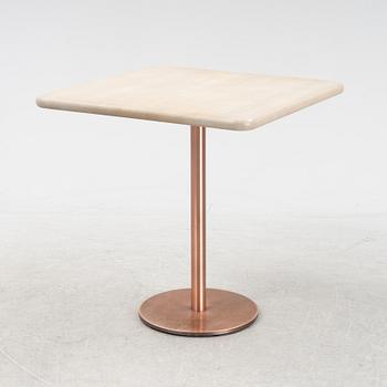 A steel and oak table by Jonas Lindvall 2011.