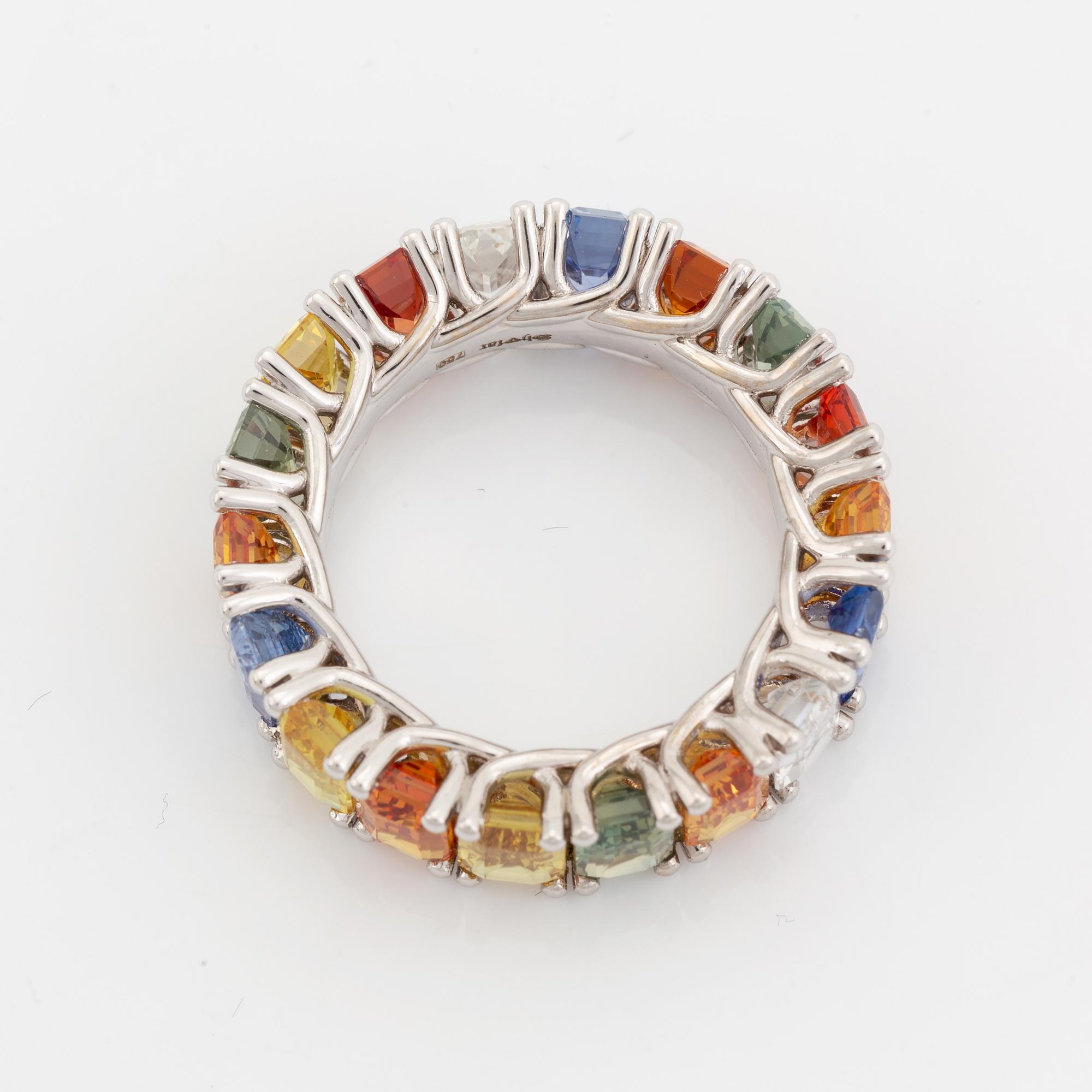 Emerald cut multi coloured sapphire ring.