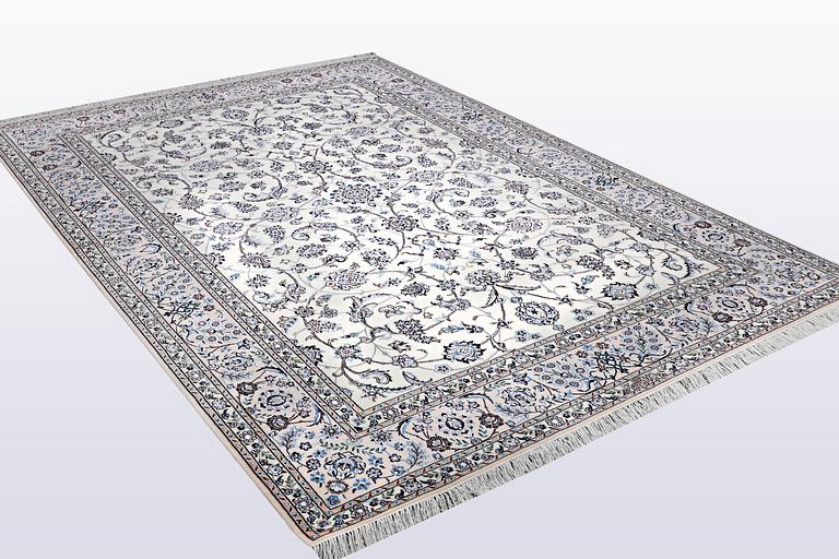 A carpet, Nain, part silk, 6 Laa, ca 301 x 203 cm.