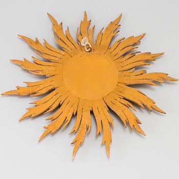 A mirror in shape of a sun, second half of the 20th century.
