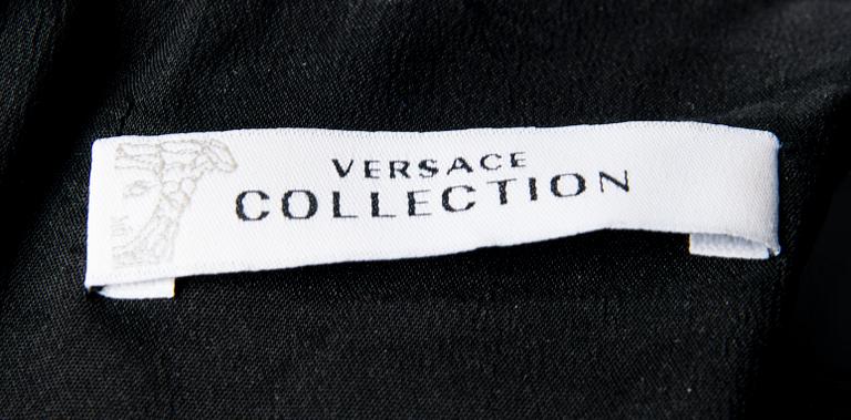 KLÄNNING, Versace.