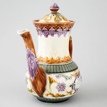 A majolica collection of one coffee pot and three tea pots from Rörstrand, around turn of the century 1900.