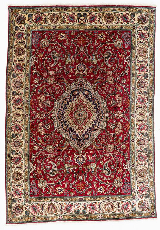 A Tabriz Carpet, circa 316 x 220 cm.