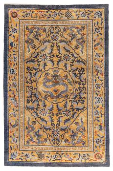 An antique Imperial silk 'Five dragon' palace rug, Qing dynasty, 1880. Measure approx. 238 x 154.5 cm.