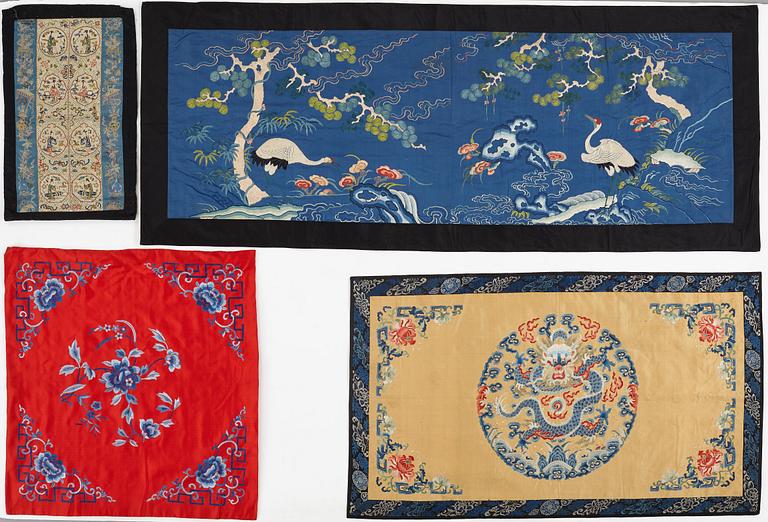 A group of Chinese silk embroideries, Qing dynasty, circa 1900.