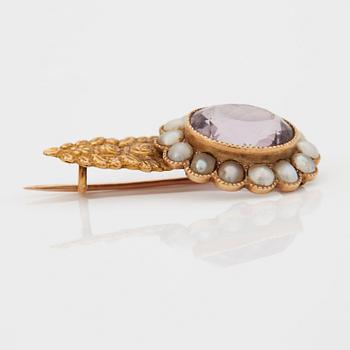 A BROOCH.