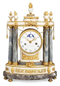 663. A Louis XVI late 18th century mantel clock, dial marked "Robert A Paris".