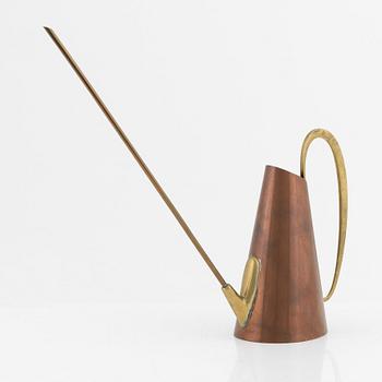 A copper and brass watercan, Illums Bolighus, Denmark, second half of the 20th Century.