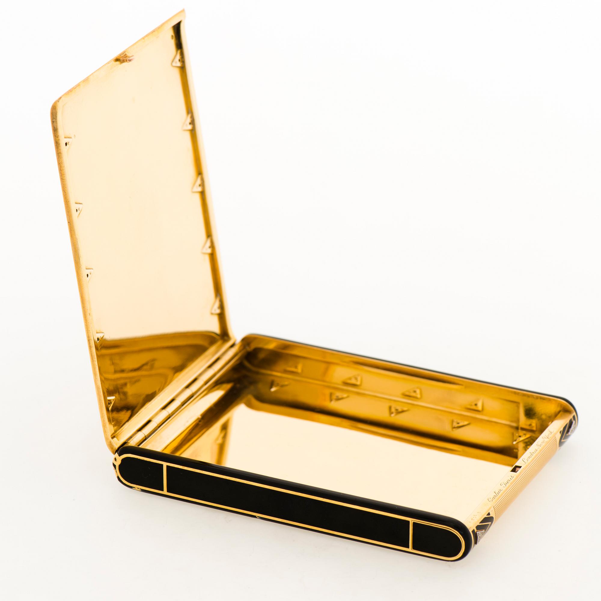 Cartier Art Deco cigarettetui 18K guld med svart emalj och åttkantslipade diamanter.