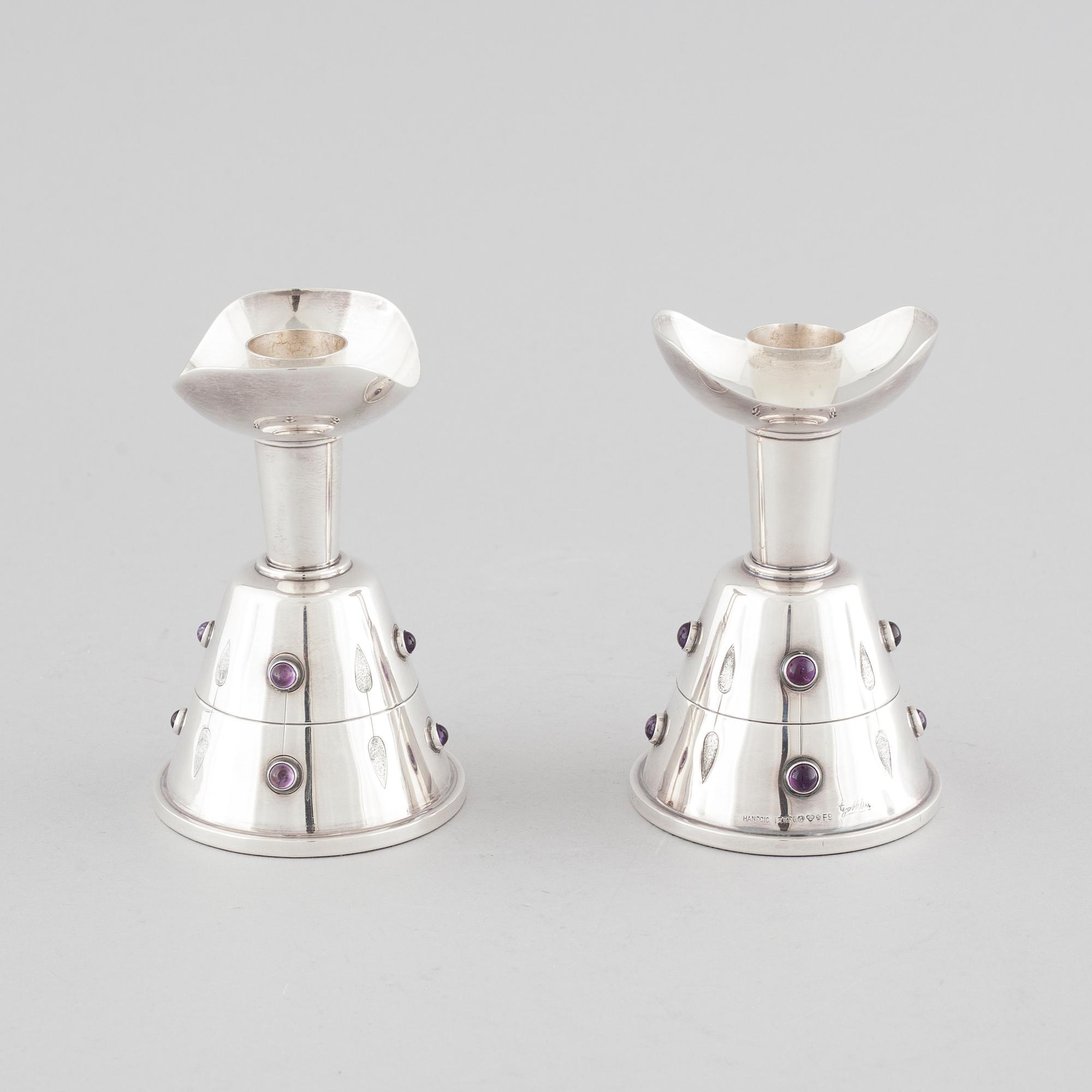 A pair of candleholders by Tage Göthlin in silver for Tesi, Gothenburg, year 1956. Weight in tot 580 gram.
