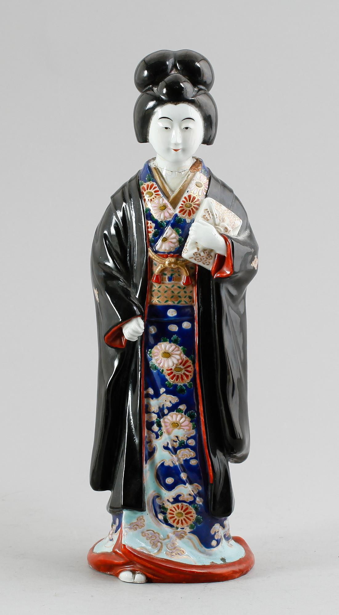 FIGUR, porslin, Japan, omkring år 1900.