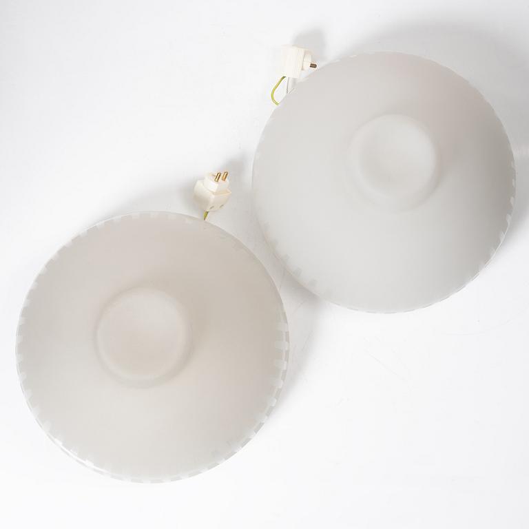 Harald Notini, or Uno Westerberg, a pair of ceiling lamps model "12012", Arvid Böhlmarks Lampfabrik, Stockholm, 1950s.