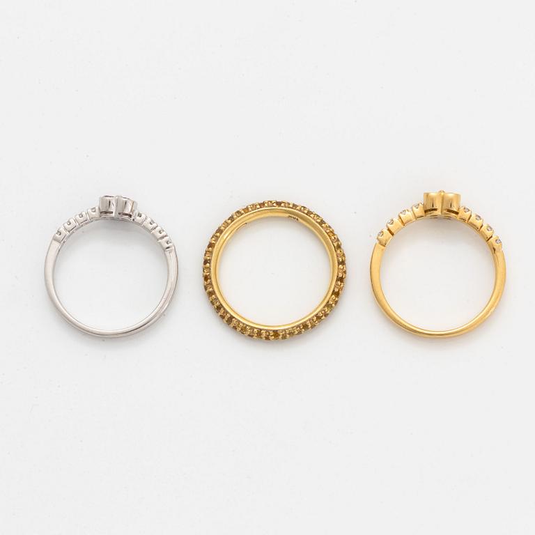 Yellow and pink sapphire and brilliant-cut diamond three rings.
