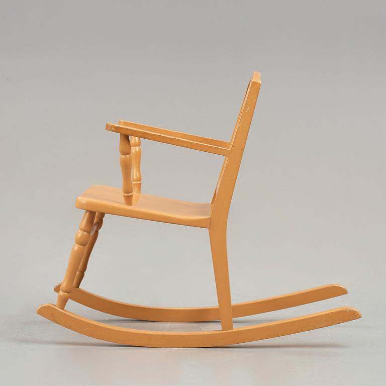 Carl Hörvik, A Carl Hörvik children's rocking chair, Nordiska Kompaniet, the model exhibited in Gothenburg 1923.