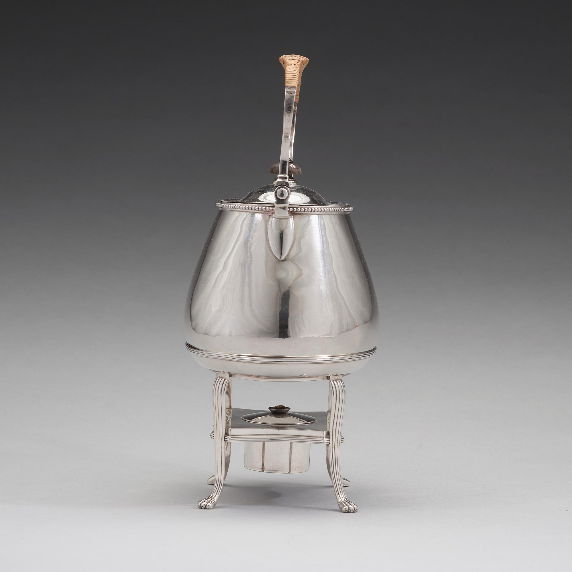 An English 18th century silver tea-pot and stand, mark of Andrew Fogelberg & Stephan Gilbert, London 1785.