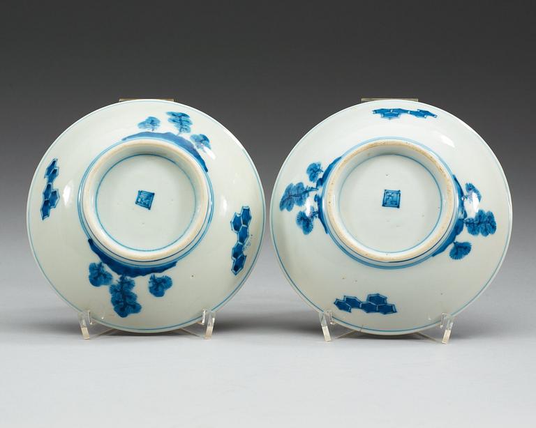 A pair of Japanese blue and white crane dishes, presumably 19th Century.