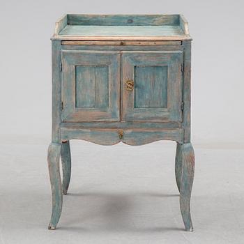 A 18th century rococo bedside table.