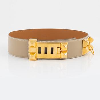 Hermès, a 'Collier de Chien' beige leather belt, 2003. Size 75.