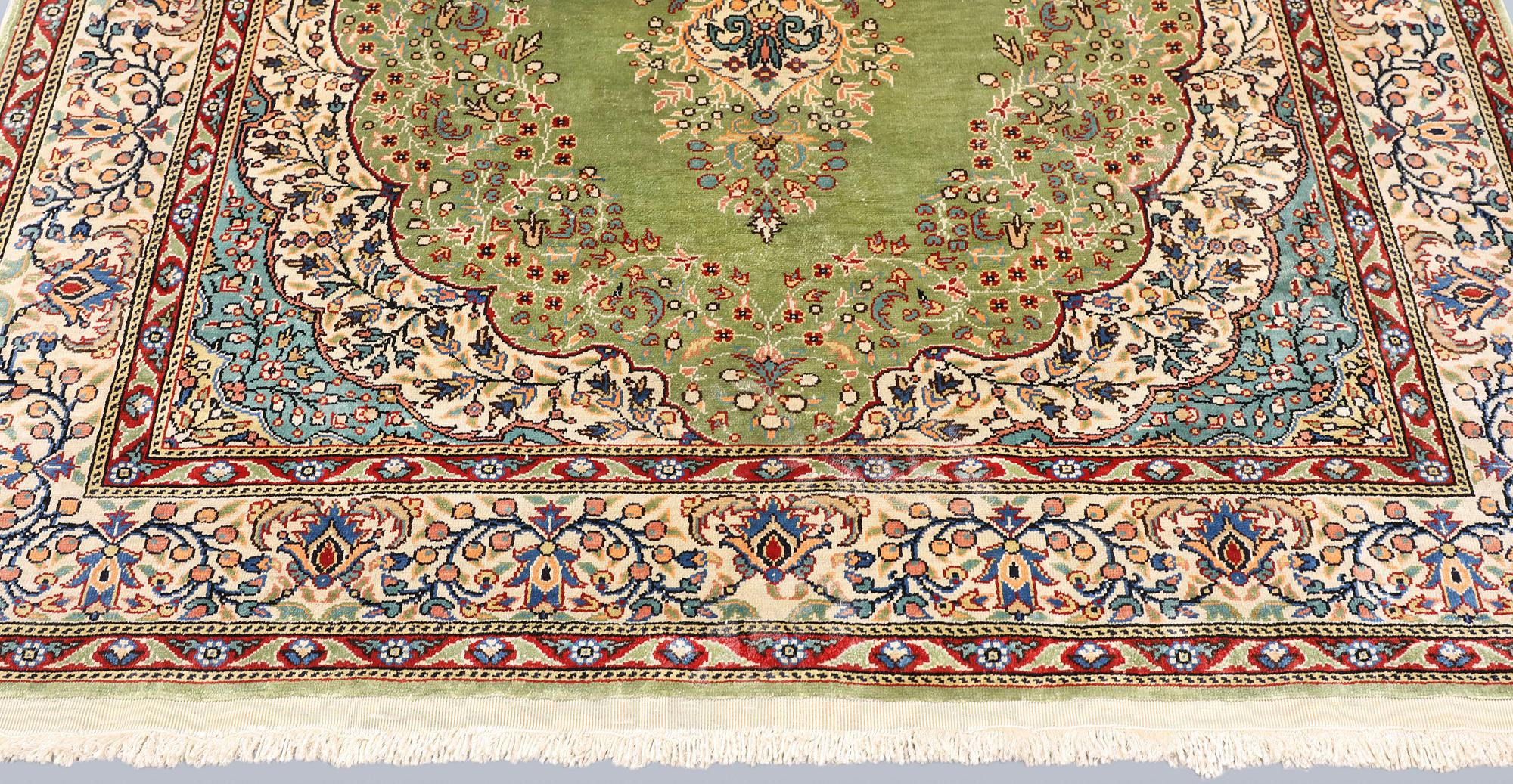 A semi-antique silk Kaysari rug, Turkey, 152 x 103 cm.