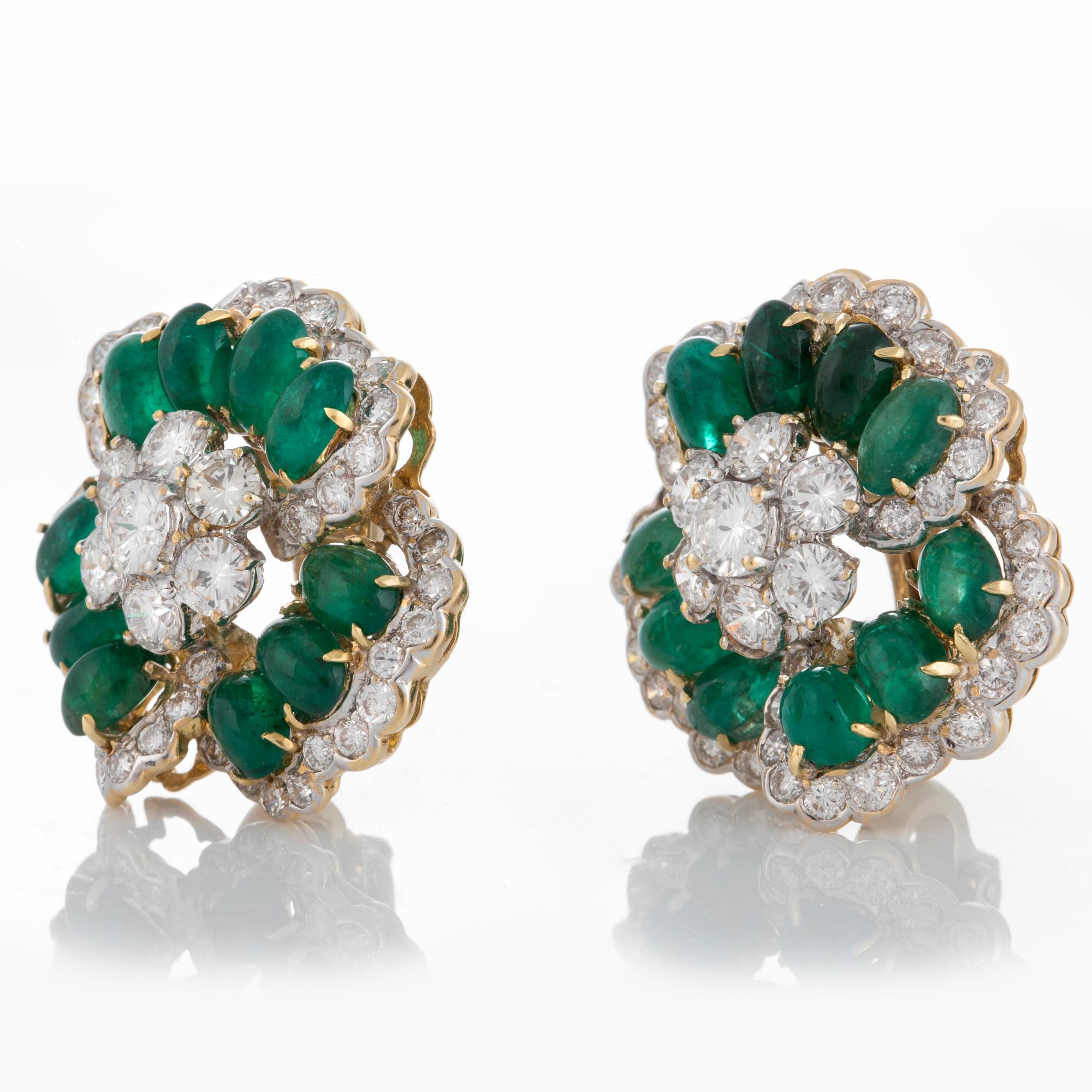A pair of Bulgari earrings set with cabochon-cut emeralds and round brilliant-cut diamonds.