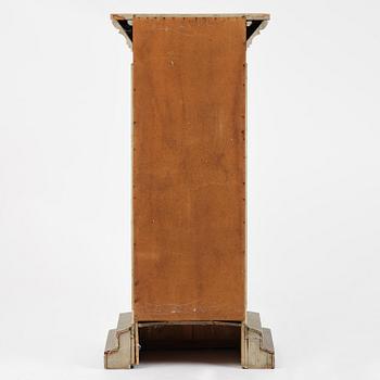 A Swedish column-shaped cabinet 19 th century.