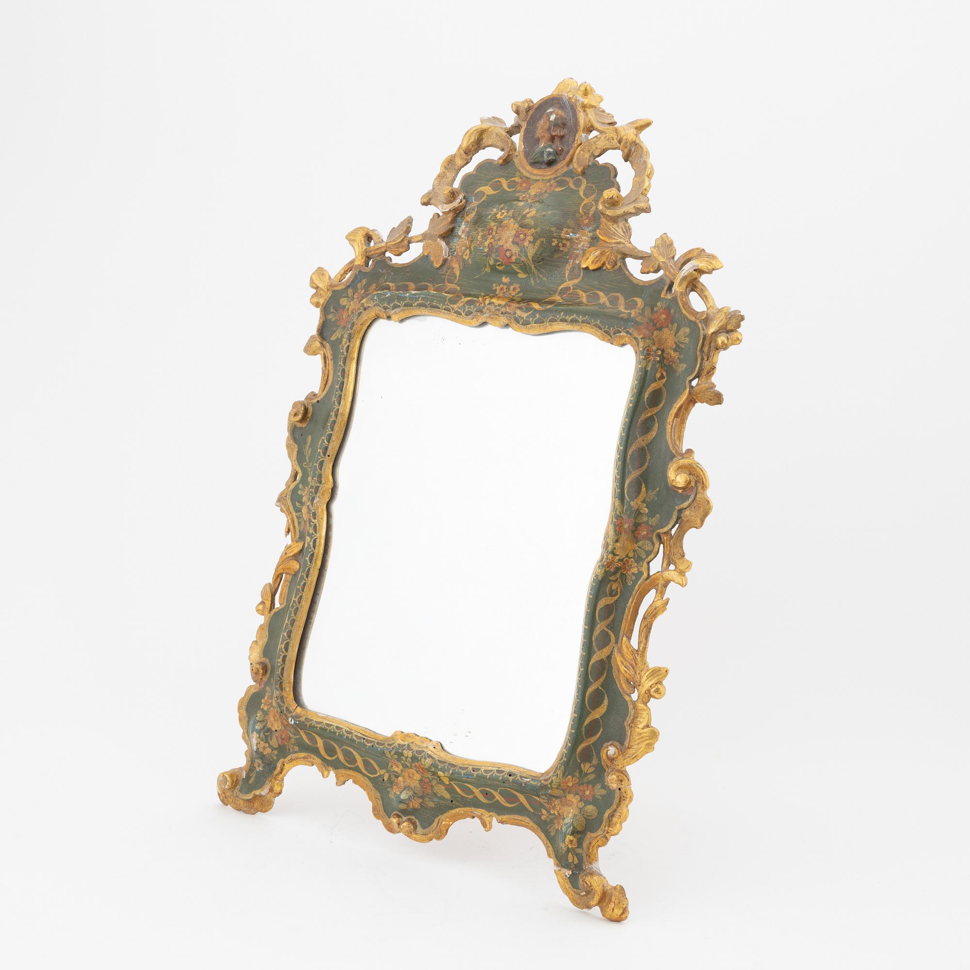 A Rococo style table mirror, probably southern Europe, around the year 1900.