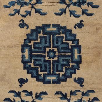 Two antique Chinese Pao-Tow rugs, c. 125 x 65 and 125 x 60 cm.