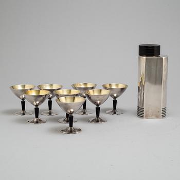 FOLKE ARSTRÖM, a silver plated cocktail shaker and eight glasses from GAB.