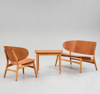 A HANS J WEGNER, a  "Shell set/ Skalsæt" comprising a sofa, a chair and a table, Fritz Hansen, Denmark 1950's.