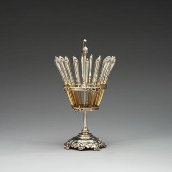 A set of 18 Russian parcel-gilt fruit knifs and stand, makers mark of Joseph Marshak, Moscow 1908-1917.