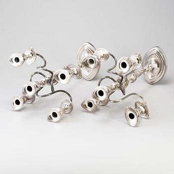 A PAIR OF SILVER PLATE CANDELABRA, regency style, England, first half of the 20th century.