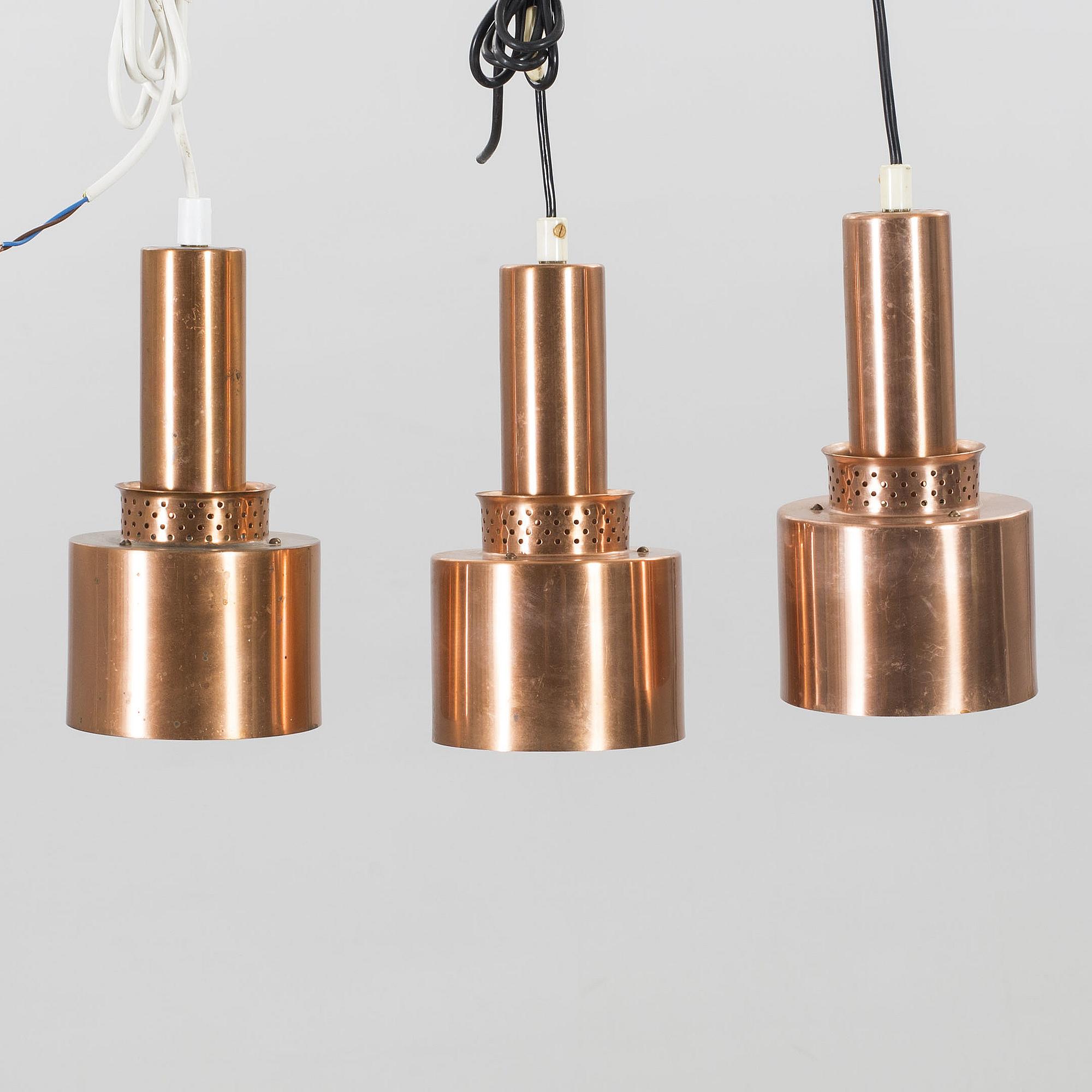 HANS-AGNE JAKOBSSON, three copper pendant lights from Markaryd.