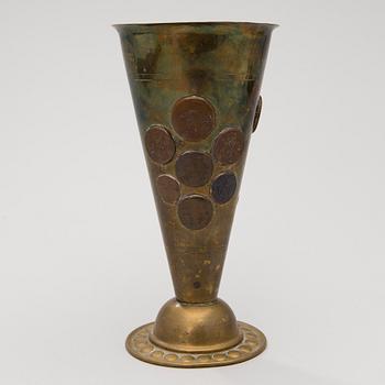 A late 19th Century brass cup.