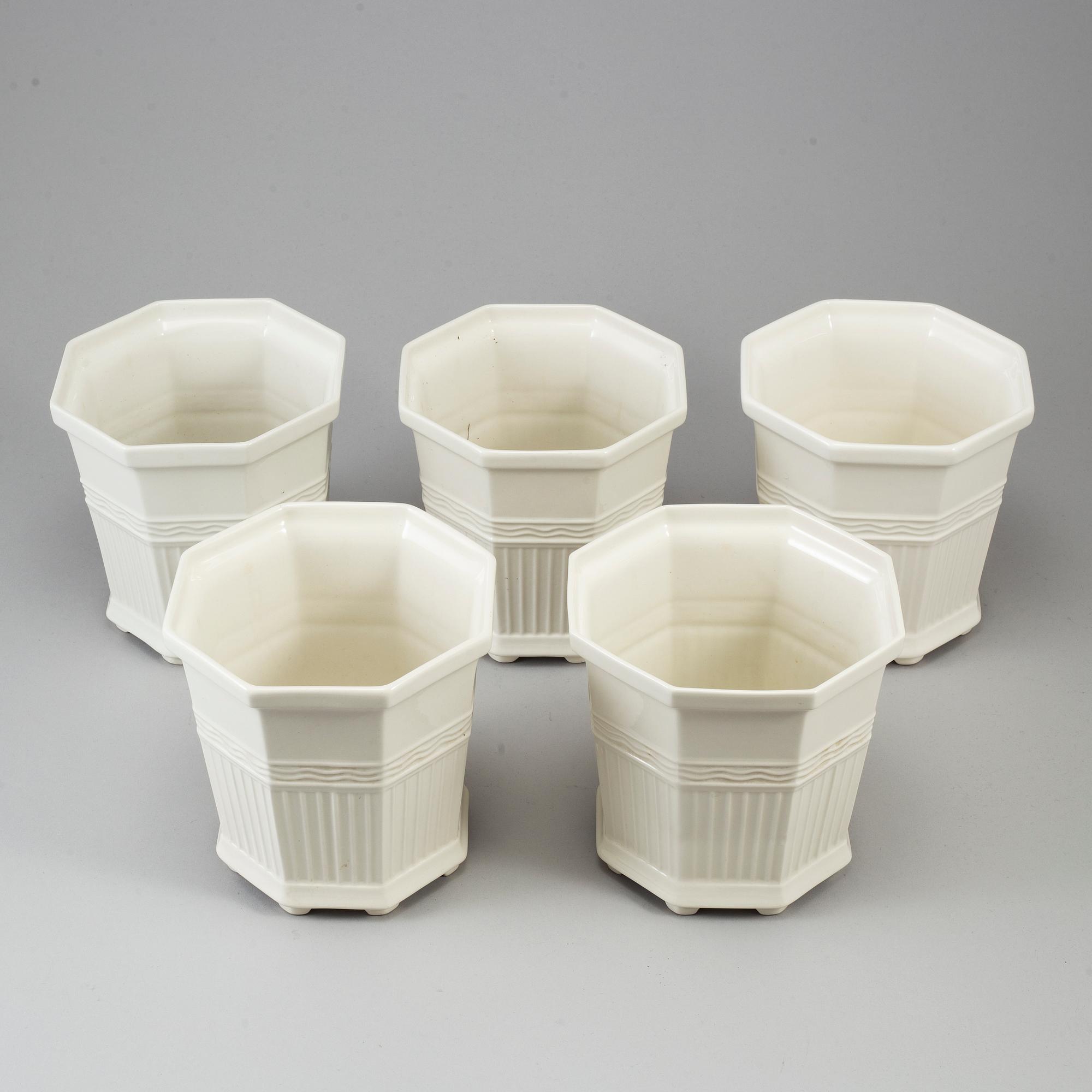 Five porcelain flowerpots by Prins Eugen.