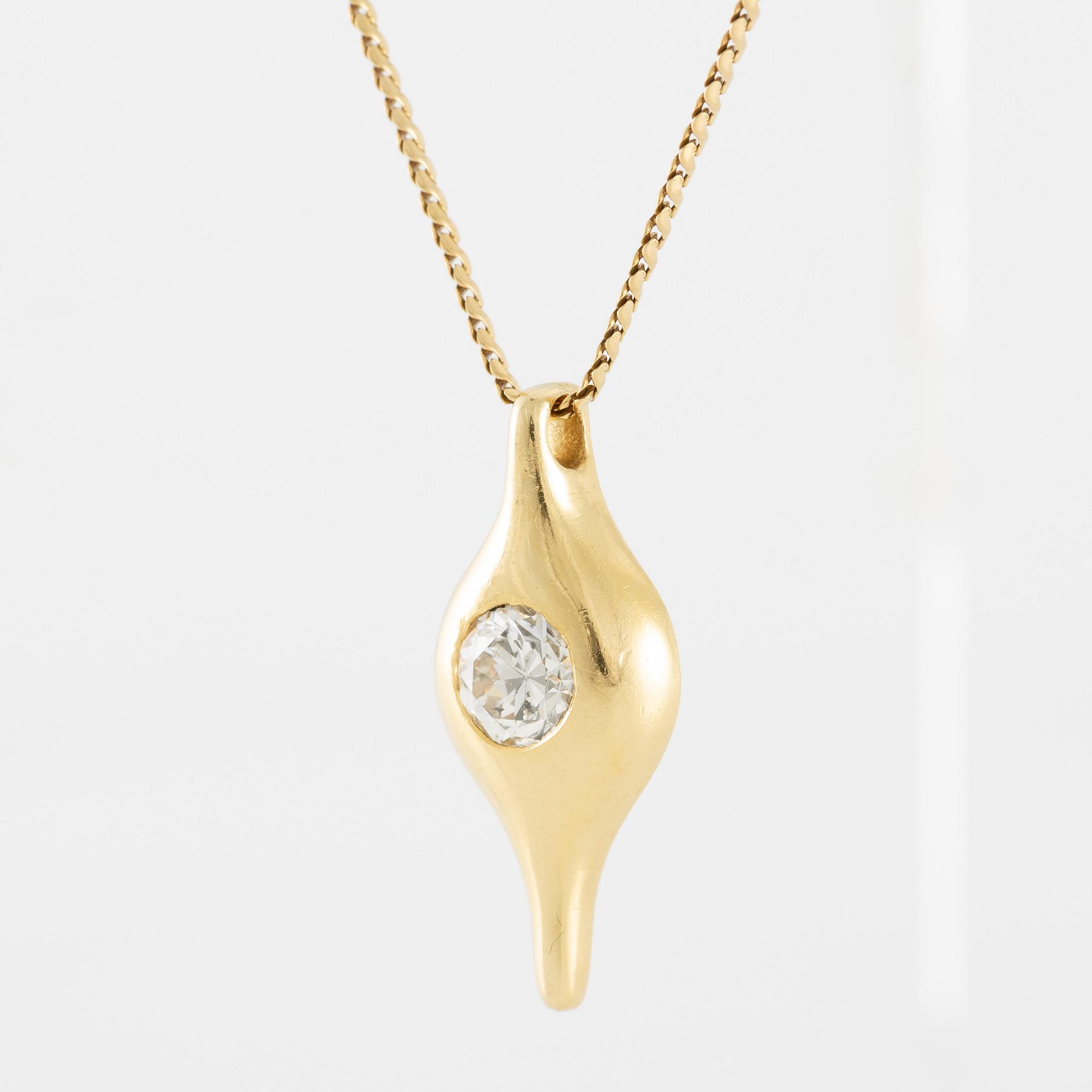Pendant in 18K gold with a round brilliant-cut diamond.