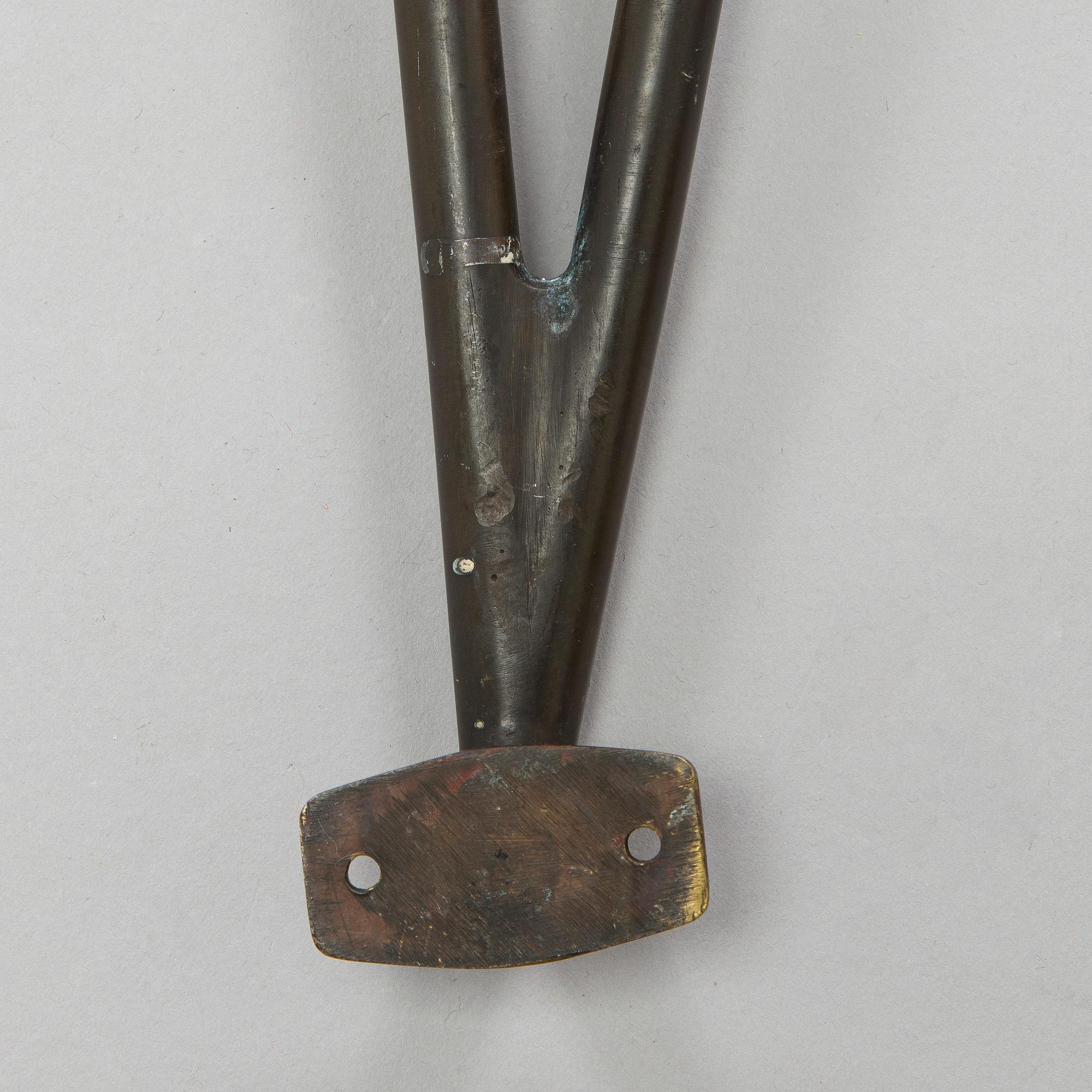 An early 20th century door handle.