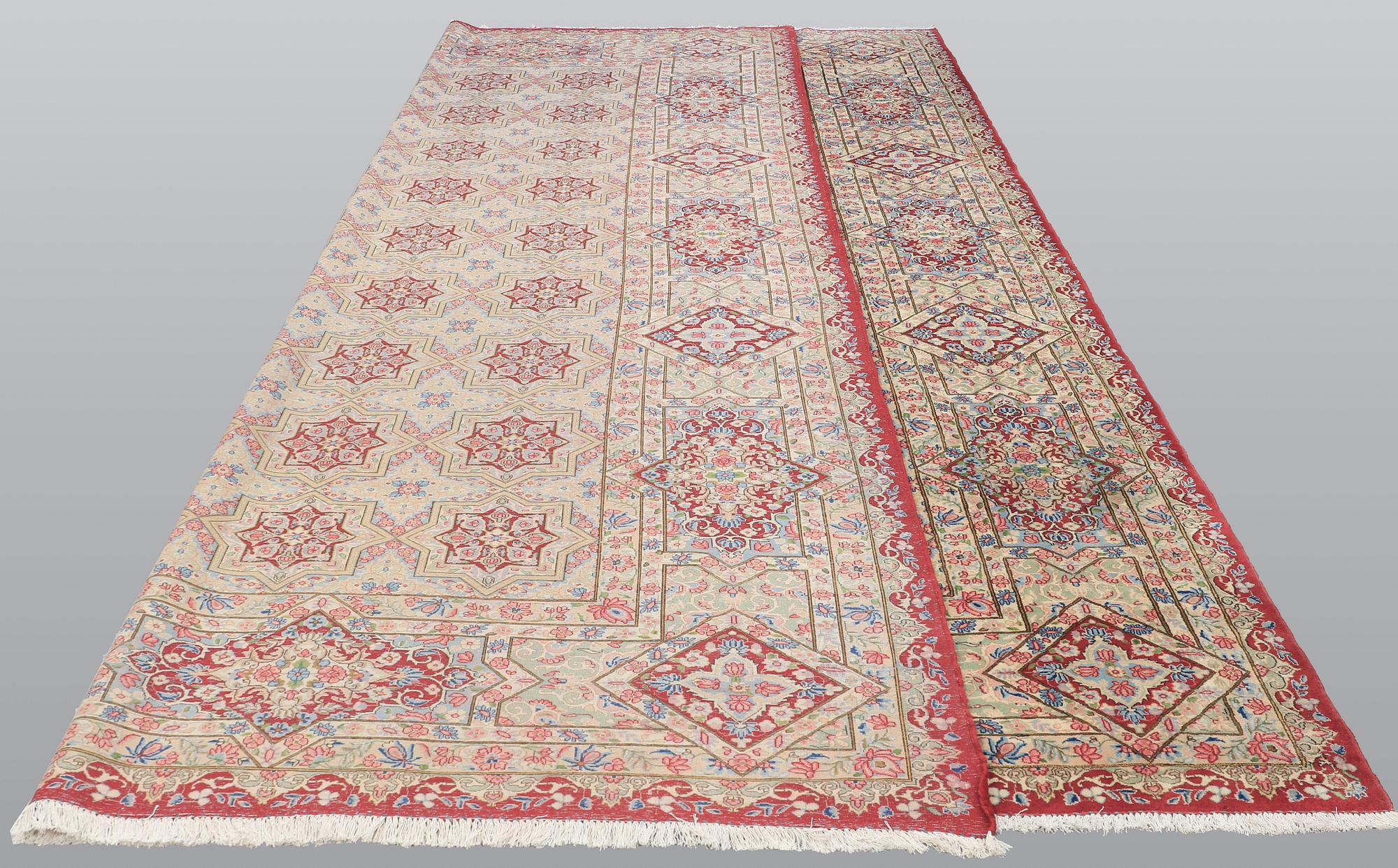 A carpet, Kerman, ca 460 x 340 cm.