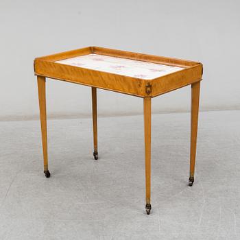 A 20th Century Gustavian style table.