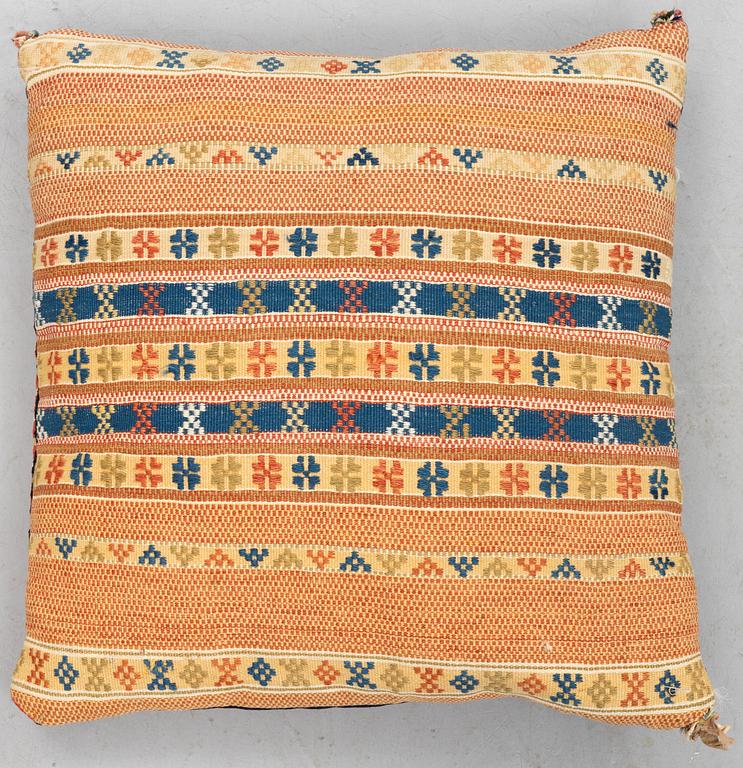 A double-interlocked tapestry cushion, ca 55 x 52,5 cm, Scania, 19th century.