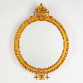 A Gustavian two-light girandole mirror, late 18th Century.