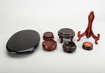 A set of 23 wooden stands, 20th century.
