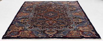 A Kashmar carpet, c. 295 x 198 cm.
