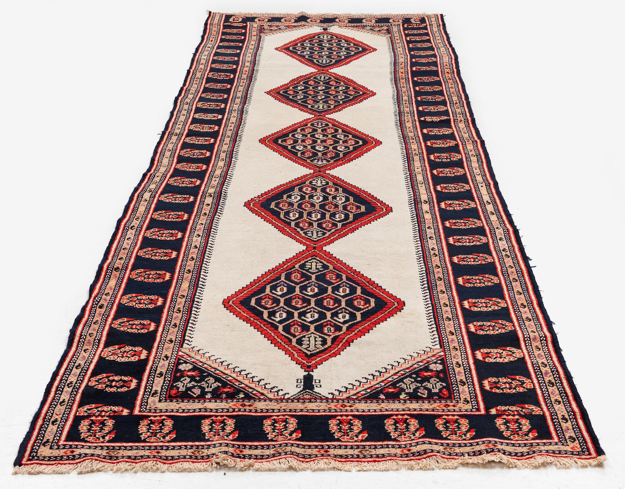 A semi-antique Northwest Persian (Iran) runner, c. 417 x 112 cm.