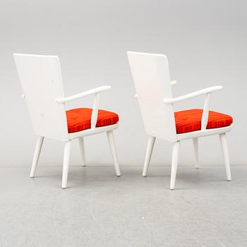 A pair of second half of the 20th century arm chairs by Göran Malmvall.