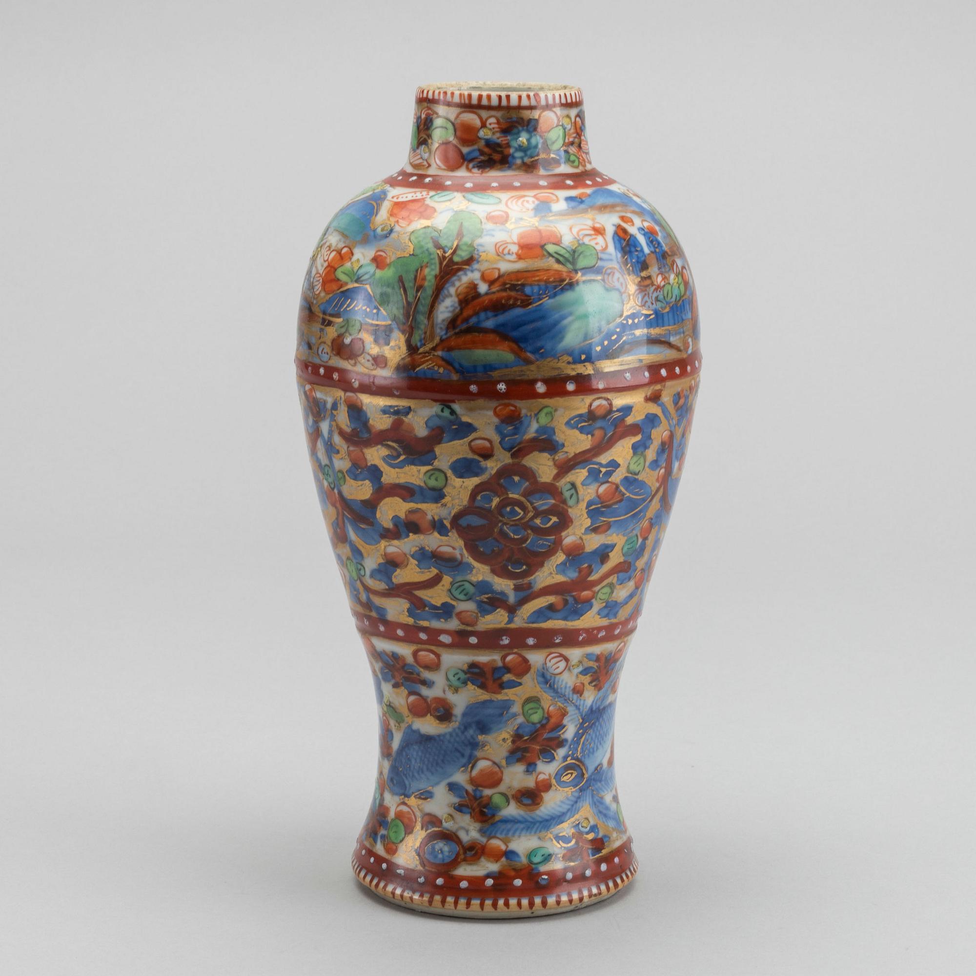 A Chinese clobbered 18th century porcelain vase, height ca 24 cm.